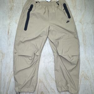 NEW Nike Tech Pack Woven Parachute Joggers Khaki Baggy Mens XL HM7158-297